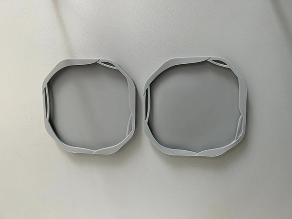 Visual quality standards board showing acceptable vs. unacceptable flash